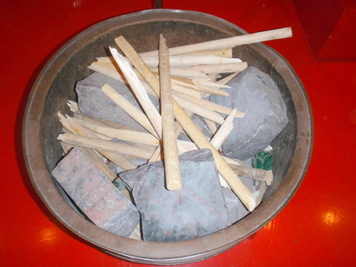 Samples of Rocks, Bricks, and Wood that were broke in two.